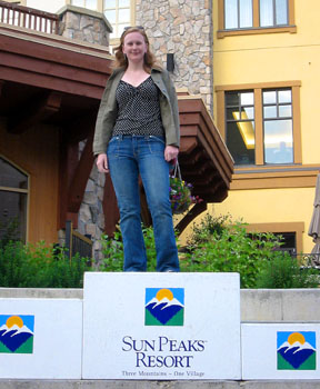 [ Emma on the top step of the podium ]