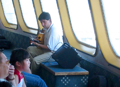 [ Singer on the ferry ]