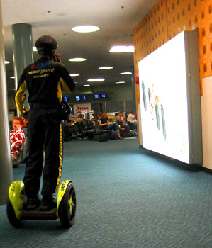 [ Security dude on Segway ]