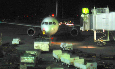 [ Our plane arrives ]