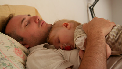 [ Having a snooze with daddy ]