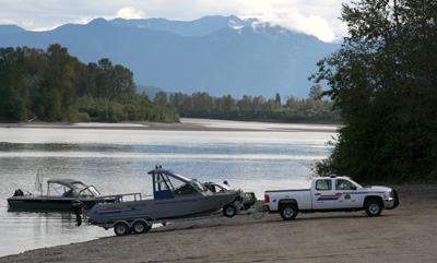 [ RCMP boat going in the water ]