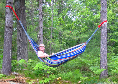 [ Sean tries out his hammock ]