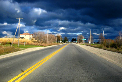 [ Dark clouds and road ]