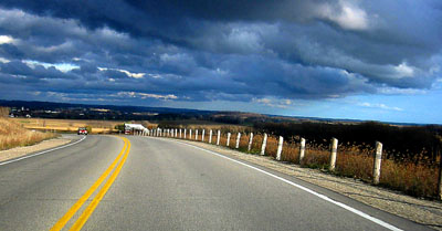 [ Dark clouds and road ]