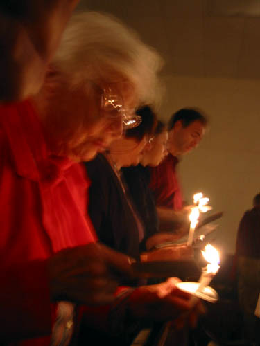 [ Candlelit church scene ]