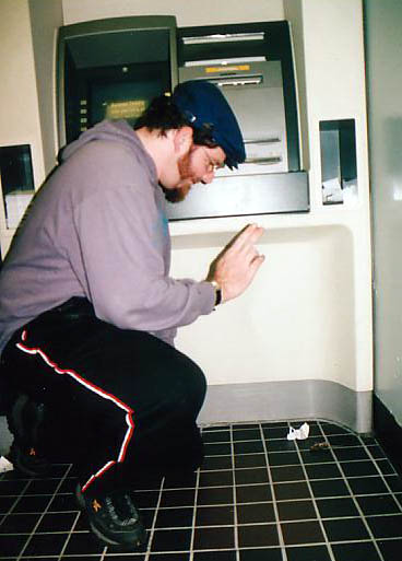 [ Scott gives the mouse its last rites. ]