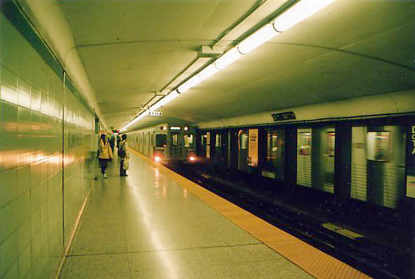 [ Subway train enters Runnymede station. ]