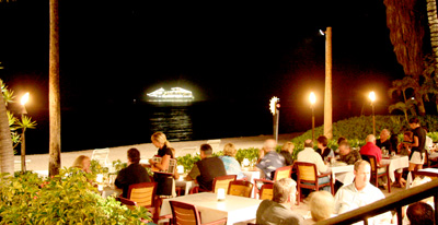 [ Dining with cruise ship behind ]