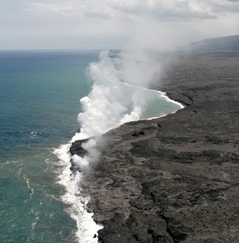 [ Steam rises where lava meets the Pacific ]