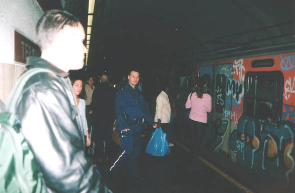 [ Cop in the subway ]