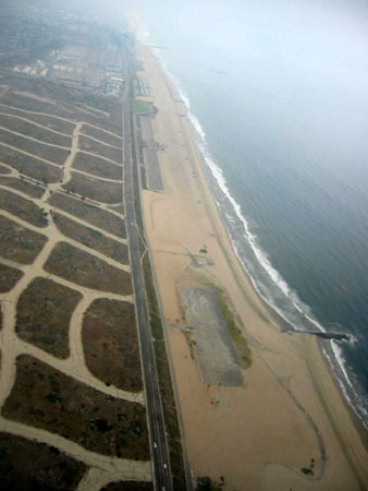 [ Departing over the beach ]