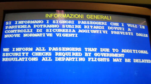 [ Airport sign about delays ]