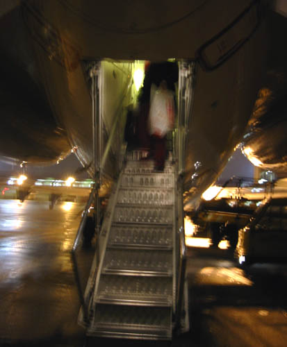 [ Blurry airplane shot ]