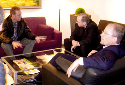 [ 
Talking in the lobby ]