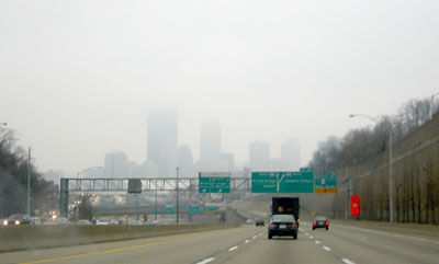 [ Foggy Pittsburgh skyline ]