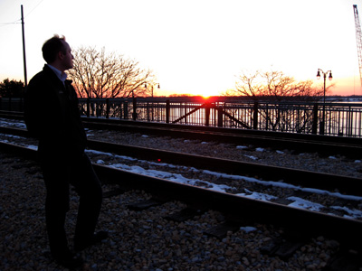 [ Alasdair looks over the Mississippi ]