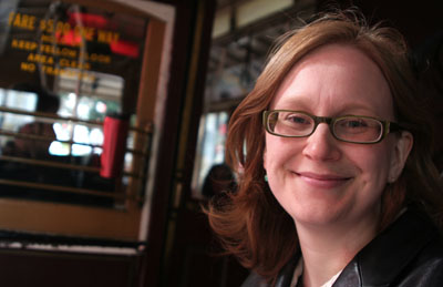 [ Emma smiling on cable car ]