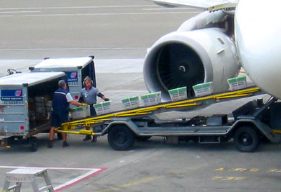 [ Unloading U.S. 

Mail ]