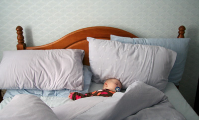 [ Morgan sleeps in the bed ]