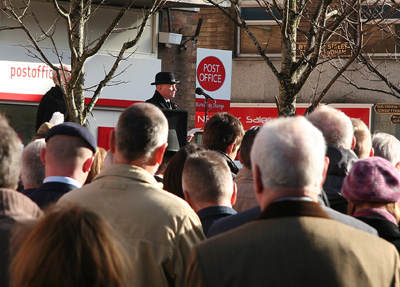 [ Man in bowler hat ]